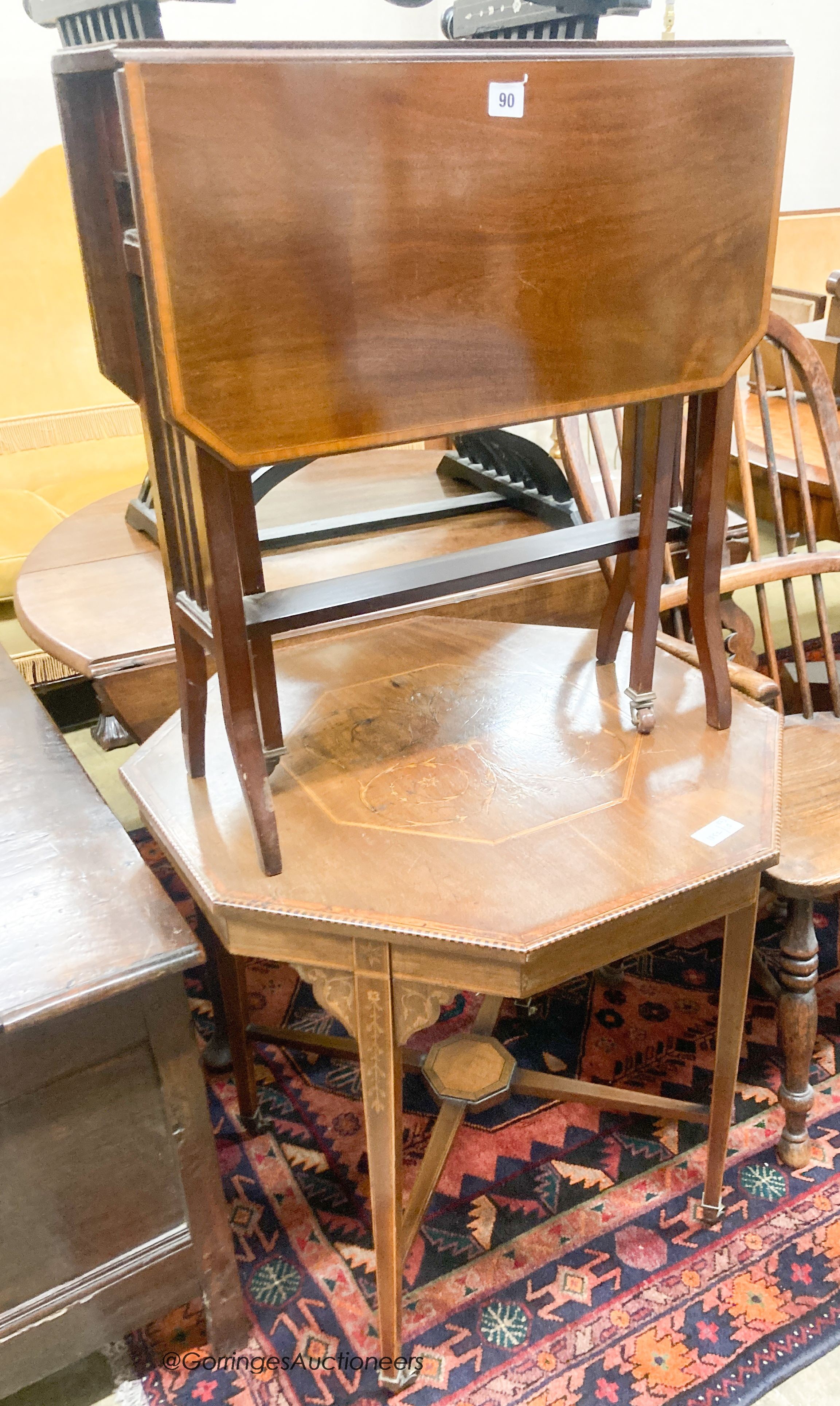 An Edwardian satinwood banded mahogany Pembroke table, height 66cm, together with an Edwardian marquetry inlaid octagonal centre table, width 69cm, height 68cm